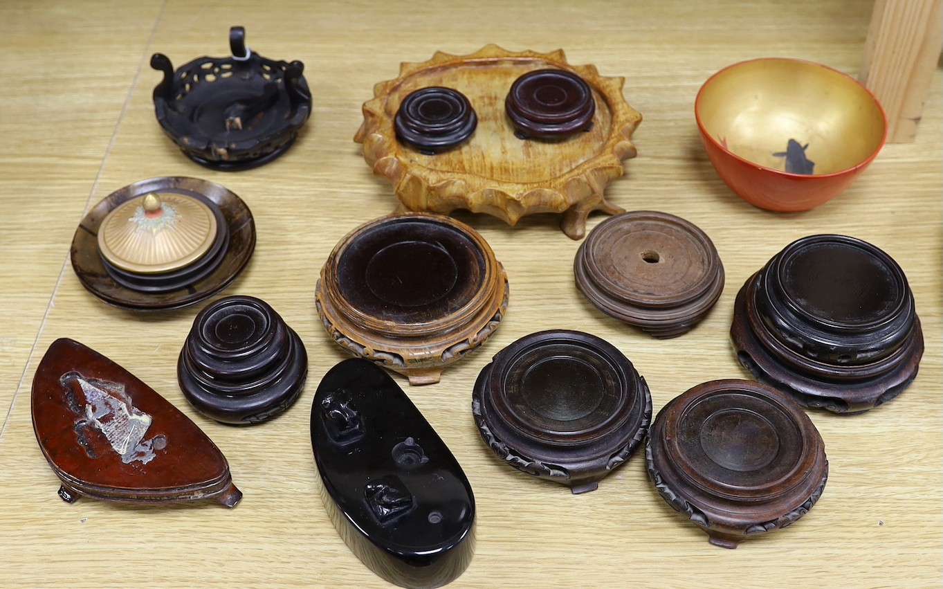 Assorted Chinese wooden stands and a lacquer bowl